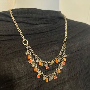 American Eagle orange, back & gray beading and bronze/gold chain
